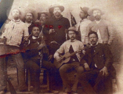 Jose Dolores Frias, center holding flute, age 31, 1894 Chihuahua, Mexico.